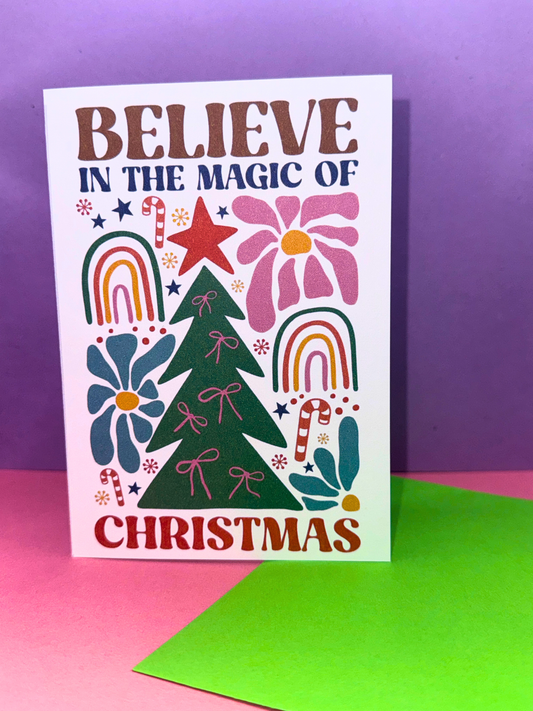 Believe in the magic of Christmas Christmas Card