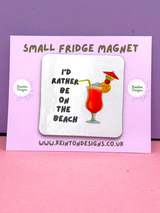 'I'd rather be on the beach' fridge magnet
